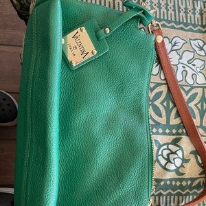 Green Valentina leather purse.